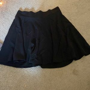 Divided zipper-back mini flare skirt